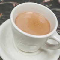 Chai Tea (Hot) · An ancient tea of India, made with black tea, milk, cardamom, cloves, fennel, and sugar.