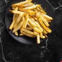 Fries · Idaho potato fries cooked until golden brown & garnished with salt