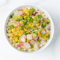 Cauliflower Fried Rice · Roasted cauliflower rice, peas, corn, green onions, and sesame seeds with our house-made gin...