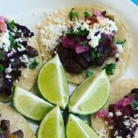 Carne Asada Street Tacos · 3 piece of tacos, topped with cilantro, queso fresco, and house made salsa. Served with rice...