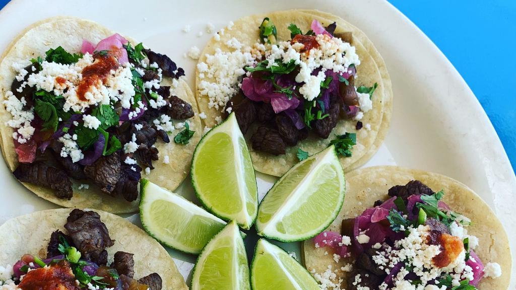 Carne Asada Street Tacos · 3 piece of tacos, topped with cilantro, queso fresco, and house made salsa. Served with rice and beans.