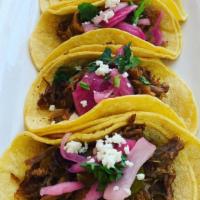 Street Tacos Al Pastor · 3 pieces of tacos, grilled pork and pineapple topped with cilantro onions, house-made salsa ...