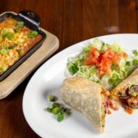 Carne Asada Burrito · Grilled steak, guacamole, pico de gallo, cheese, served with rice and beans.
