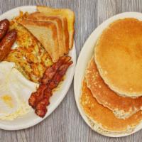 Mark'S Big Daddy Breakfast · Three eggs, two strips of bacon, two sausage links, three hotcakes, toast and hash browns.