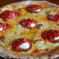 Comet Pizza · garlic herb oil, mozzarella, provolone, meatball, roasted garlic, ricotta, topped with red s...