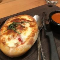 Garlic Boat · house dough, roasted garlic, ricotta, mozzarella, marinara