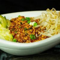 Dan Dan Noodles · Ground white meat chicken, garlic, and scallions. Wok-seared in a chili soy sauce and served...