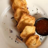 Crab Rangoon · Deep sea red crab meat, cream cheese, scallions and red bell peppers wrapped in a wonton she...