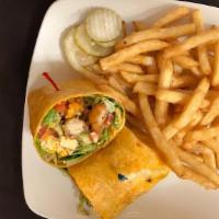 Crunch Wrap Tempura Chicken · With sweet chili bacon, fresh avocado, romaine, tomato, cheddar cheese and our house made ra...