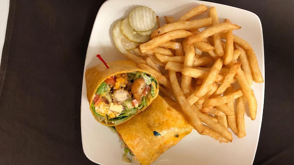 Crunch Wrap Tempura Chicken · With sweet chili bacon, fresh avocado, romaine, tomato, cheddar cheese and our house made ranch dressing in a soft grilled chipotle tortilla.