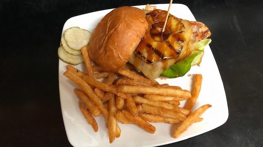 Hula Hula Chicken · Flame grilled teriyaki chicken, charred pineapple pepper jack, fresh tomato, butter leaf lettuce and mayo on a fresh baked bun.