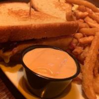Club Reef · Slow roasted turkey breast, ham, smoked and peppered bacon, Swiss cheese, tomato, butter lea...