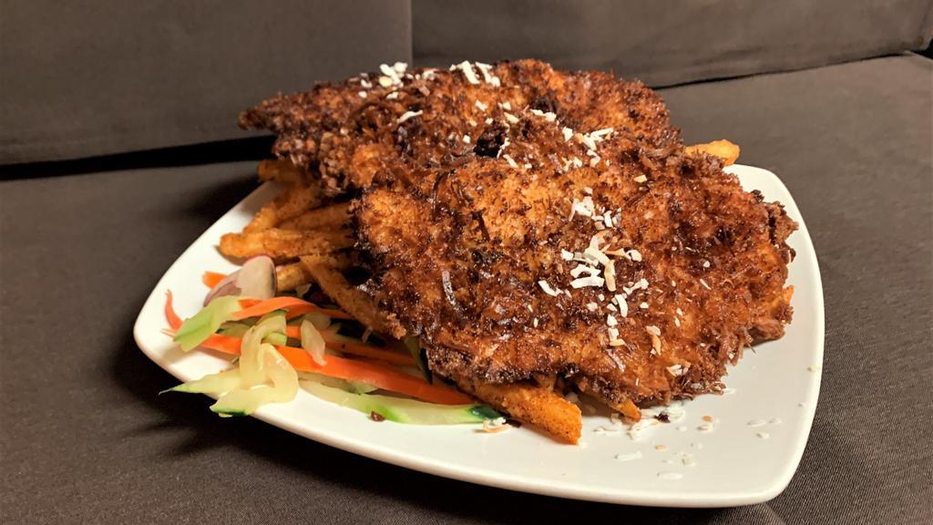 Coconut Chicken · Crispy coconut chicken breast strips served with sweet Thai chili dipping sauce.