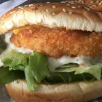 Salmon Burger · Salmon patty with American cheese, tartar sauce, lettuce and tomato