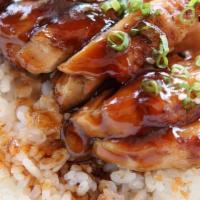 Teriyaki Chicken · Grilled chicken with rice and salad.