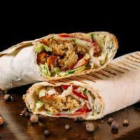 Shawarma With Hummus · Platter of hummus topped with your choice of: lamb or chicken shawarma.