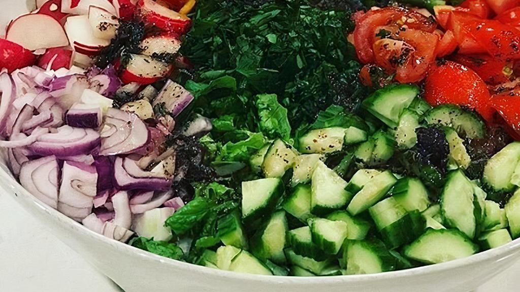 Salata Al- Amir · Vegetarian. Mixed greens, cucumbers, tomatoes and parsley. Mixed with Al-Amir’special garlic dressing.