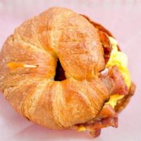 Croissant Or English Muffin · Scrambled eggs topped with your choice of ham, bacon, sausage or chicken and your choice of ...