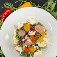 House Salad · Baby arugula, purple cabbage, cherry tomatoes, oranges, fresh mozzarella and feta with ln-ho...