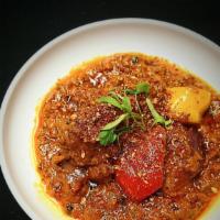 Kadai Lamb · Lamb, Bell-peppers onions blended in-house ground spices,