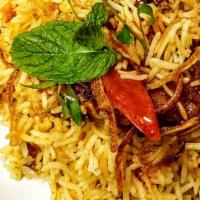 Goat Biryani · Dum rice cooked wonderfully in low flame with goat infusions of various spices.