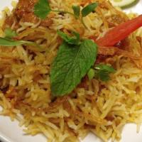 Lamb Biryani · Dum rice cooked wonderfully in low flame with lamb infusions of various spices.