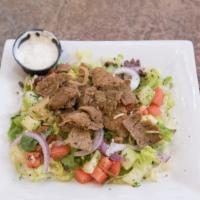 Gyro Salad · Lettuce, tomatoes, onions, cucumber and parsley mixed with albasha dressing.