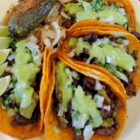 Tacos Borrachos · Street Taco served with Steak, Cactus, Chorizo, Salsa, Onion and Cilantro