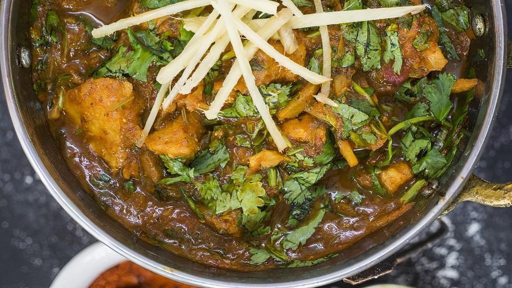 Karahi Curry Bowl (Vegan) · Cilantro and tomato based reduction stir-fried with a rioting blend of ginger, chilies, and spices.