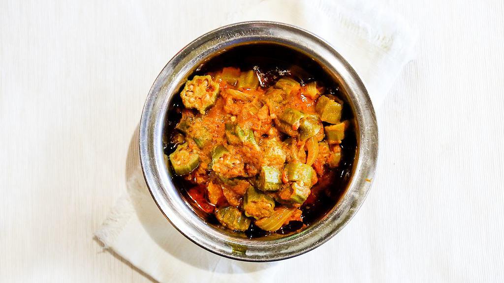 Bhindi Masala · Vegan. Okra sauteed with onion, tomatoes, and Indian spices.
