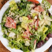 Side Greek Salad · Romaine lettuce, tomatoes, cucumbers, feta cheese, olives, green peppers, with house dressing.