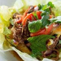 Beef Salad · Charbroiled beef with cucumber, red onion, tomato, cilantro in a spicy lime sauce.  . Tastes...