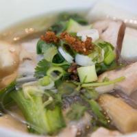 Tofu Soup. · Bean thread noodle, Napa cabbage, spinach, celery, onion and soft tofu in a clear broth.   ....