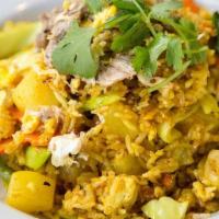 Yellow Curry Fried Rice. · Stir-fried steamed jasmine white rice with yellow curry, pineapple, carrots, cabbage, onion,...