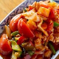 Sweet & Sour. · Stir-fried onion, cucumber, tomato, pineapple and bell pepper in tangy sweet & sour sauce.