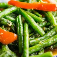 Green Beans Chili Sauce · Green beans flash fried then stir-fried in our house roasted chili sauce with red bell peppe...