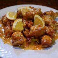 Orange Chicken. · Crispy fried boneless chicken breast covered in a sweet and savory homemade sauce.  Served w...