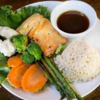 Grilled Wild Salmon · Barbecued filet of wild caught Alaskan Coho salmon served with fresh grilled broccoli, . asp...