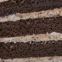 Cookies & Cream Cake Slice · Decadent chocolate cake filled with silky cookies and cream mousse