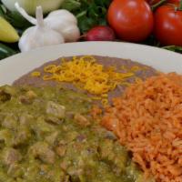 #17. Green Chile Plate · Diced Pork with Green chili Sauce. Rice. Beans and Cheese included