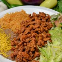 #18. Adobada Plate · Chopped seasoned pork, Pico and Guacamole. All combos include Rice and Beans with Cheese