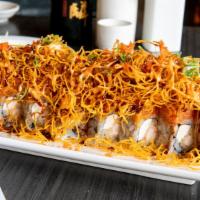 Red Dragon Roll · Shrimp tempura, cream cheese topped with spicy tuna, fried sweet potato, eel sauce. Spicy ma...