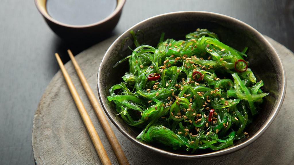 Seaweed Salad · Thinly sliced seaweed marinated in a light soy, sesame and rice vinegar dressing.