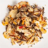 Squid Salad · Tender, thinly sliced squid, scallions, chili peppers and wood ear mushrooms marinated in a ...
