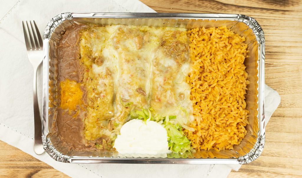 Enchiladas Verdes · Three pork enchiladas deliciously smothered with our green tomatillo sauce and garnished with sour cream and lettuce. Served with rice and beans.