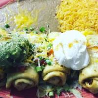 Flautas · Flour tortillas filled with spicy shredded beef, ground beef, or chicken, lettuce, tomatoes,...