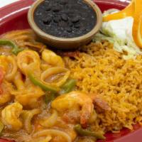 Camarones Colima · Delicious prawns prepared with bell peppers, bacon, onions, celery, carrots with delicious M...