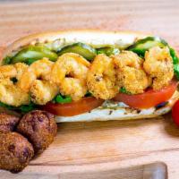 Po-Boy Sandwich. · Choice of brisket, catfish or shrimp on a toasted hoagie roll, with lettuce + tomato. Choice...