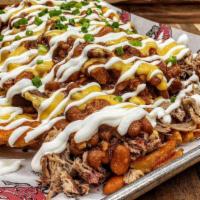 Bbq Nacho Fries · Waffle Fries topped with your choice of meat, Kickin' Bbq Beans, Nacho Cheese, Sour cream an...