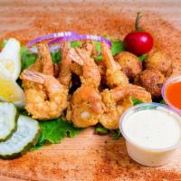 Shrimp Plate · 10 Pieces of Fried Shrimp, 3 Hush Puppies and your favorite side!